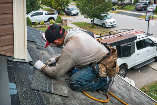 Professional Roofing technician working in Barker, TX